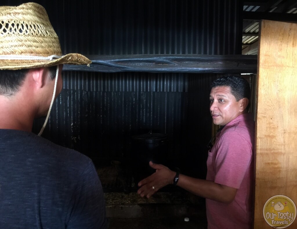 Luis from El Fogon sharing how the open hearth oven works in Belizean cooking