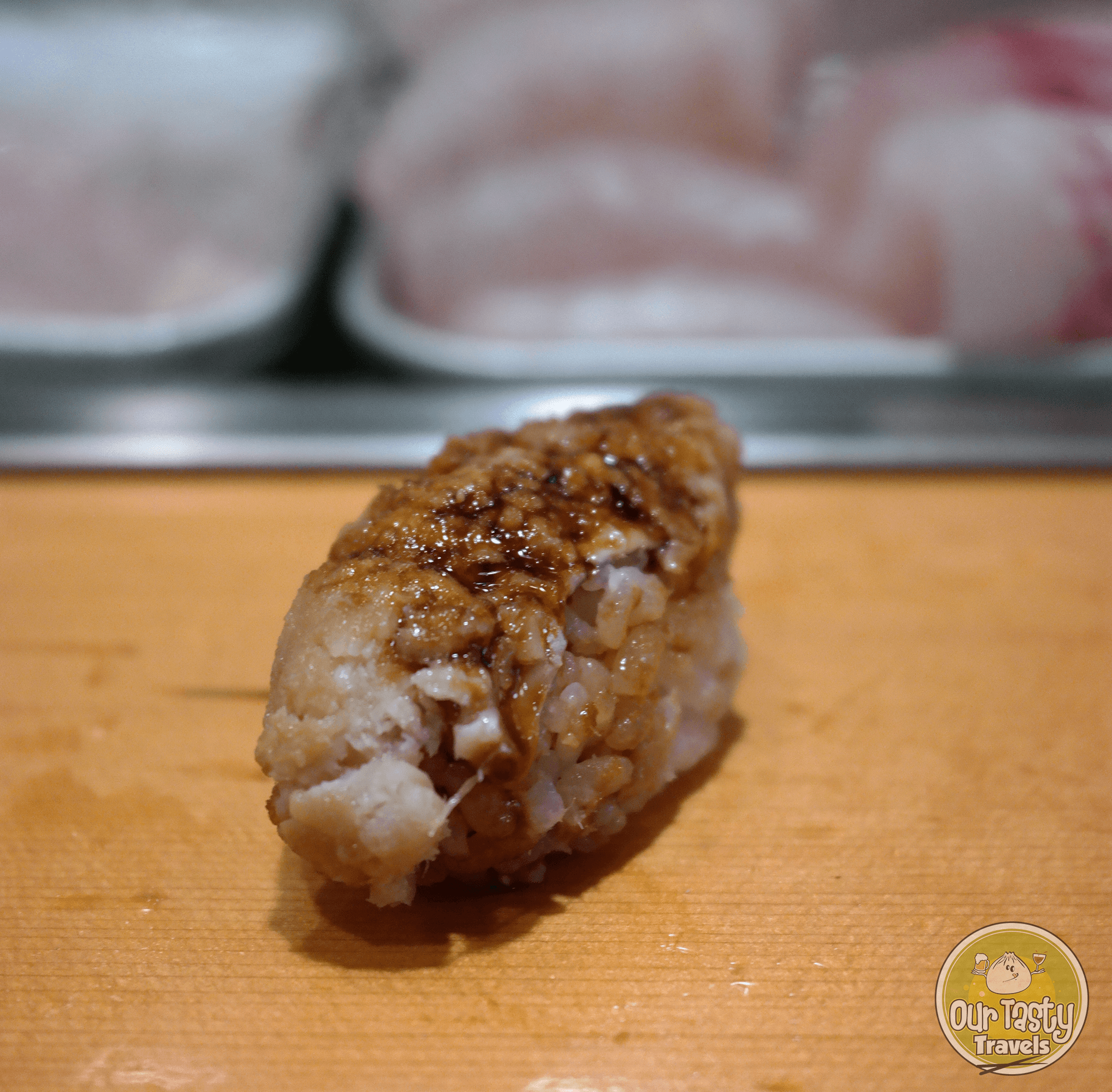 Anago or Sea Eel Sushi Dai at Tsukiji Fish Market in Tokyo, Japan -- ourtastytravels.com