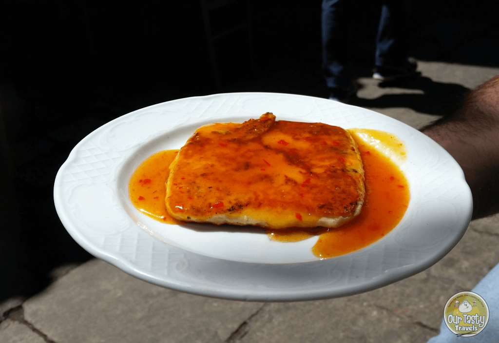 Saganaki hard cheese with honey from To Kafeneio in Athens, Greece - ourtastytravels.com