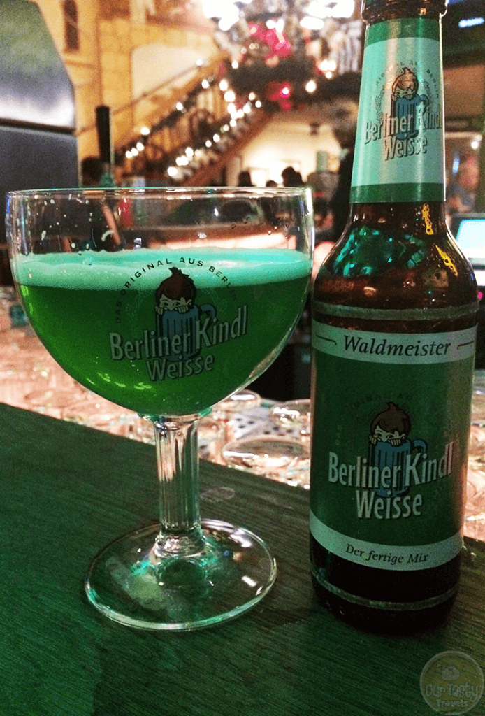 27-Nov-2015: Berliner Kindl Weisse mit Schuss Waldmeister by Berliner-Kindl-Schultheiss-Brauerei. Wtf? It's bright green?!? Like, Neon! That was quite unexpected when it was placed in front of me. And so was its quality! A marzipan, nutty, sour flavor. Quite a surprise vs the first appearance. But...I do like it! #ottbeerdiary