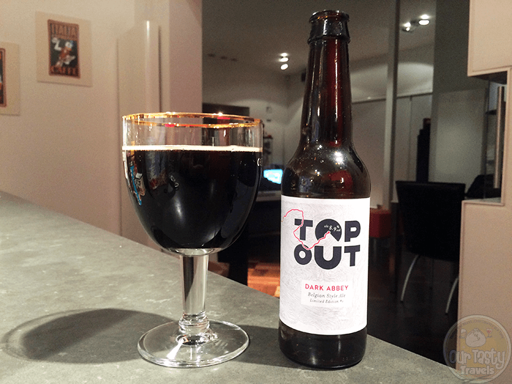 22-Oct-2015: Dark Abbey by Top Out Brewery. Quite tasty! Chocolate and vanilla aroma (tootsie roll!). Dark chocolate and coffee flavors over a bitterness. Perhaps a bit astringent. Some fruitiness, which explains some why this is a Belgian Strong Dark Ale as opposed to a Stout. Picked this one up in Scotland last year. Limited Edition 1. Best by was August, but able to age. 8.9%. #ottbeerdiary