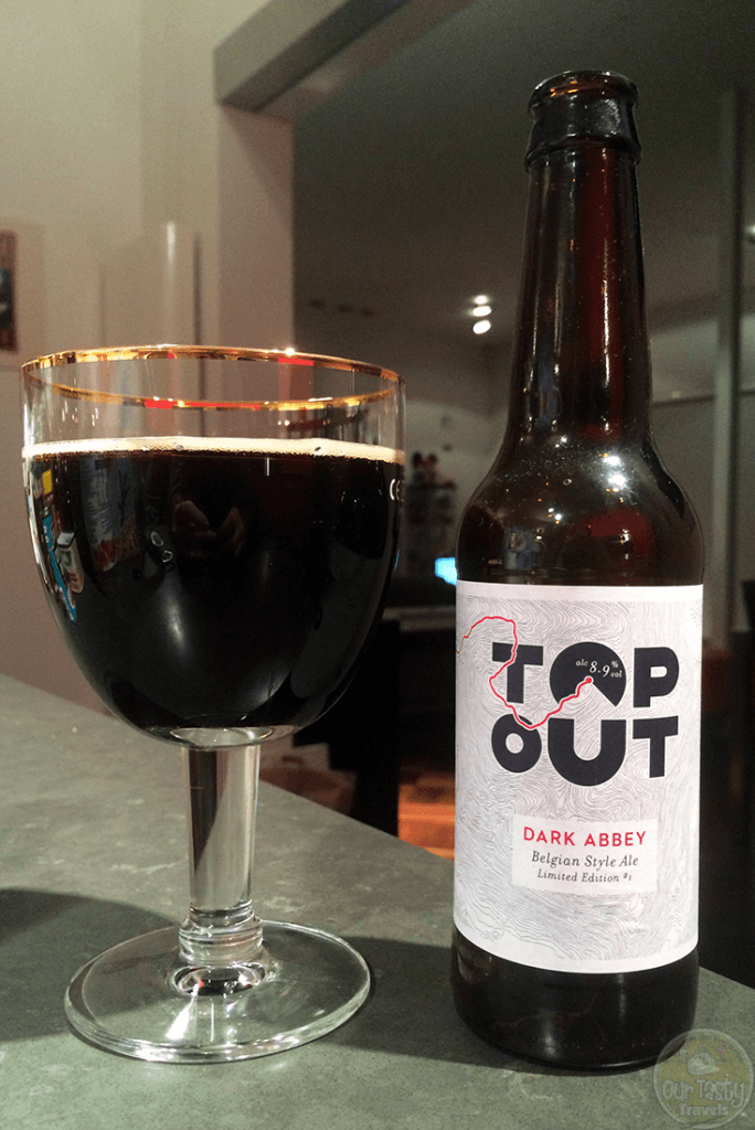 22-Oct-2015: Dark Abbey by Top Out Brewery. Quite tasty! Chocolate and vanilla aroma (tootsie roll!). Dark chocolate and coffee flavors over a bitterness. Perhaps a bit astringent. Some fruitiness, which explains some why this is a Belgian Strong Dark Ale as opposed to a Stout. Picked this one up in Scotland last year. Limited Edition 1. Best by was August, but able to age. 8.9%. #ottbeerdiary
